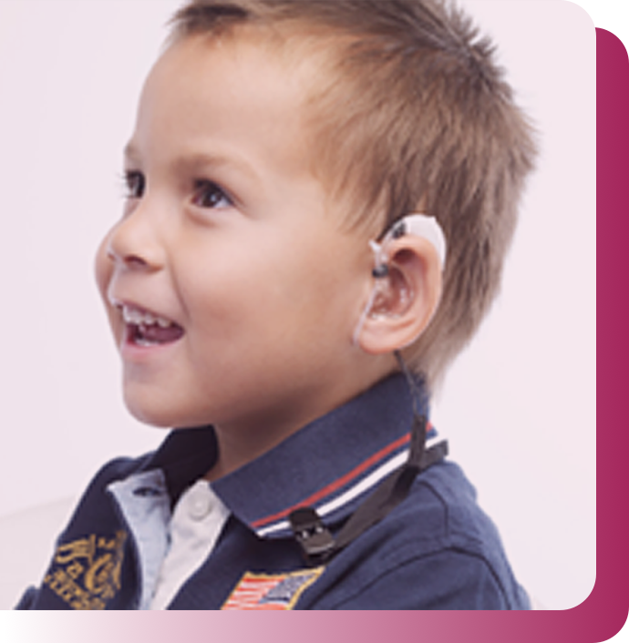 Boy with a hearing aid.